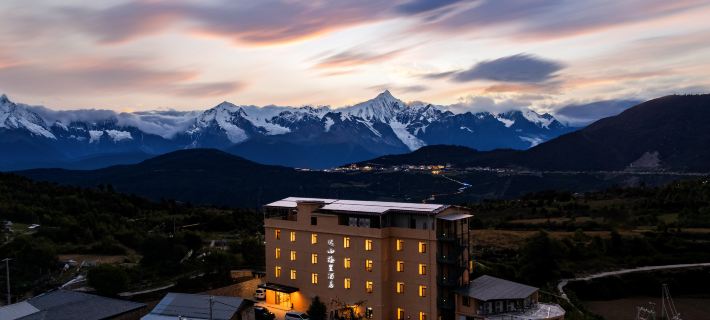 Yuanshan Meili Hotel (Wunongding) Hoteles en Deqin