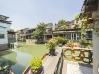 Corner Inn (Zhujiajiao Ancient Town) Отели рядом с достопримечательностью «Парк Ориентал-Лэнд»
