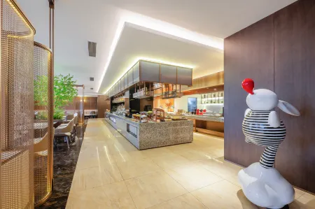 Shanghai Maixinge International Hotel (Zhoupu Metro Station Wanda Plaza ) Отели рядом с достопримечательностью «Shanghai Customs College»