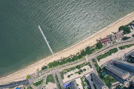 Enjoy Villa Resort Отели рядом с достопримечательностью «Shili Yintan (Shili Silver Beach)»