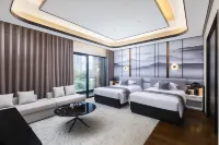 Gongqing City GINLAN JIA Hotel - parcheggio