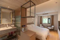 Luoyang Hemujia Art Homestay (Luoqi Ancient City Branch) Отели в г. Лоян