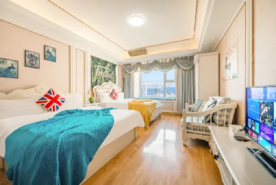 Ganghui Four Seasons Hotel Apartment (Dalian Railway Station Zhongshan Square)