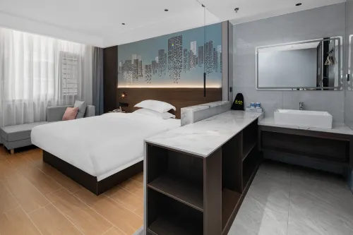 Meinianhua Hotel (Yulin Railway Station Nanxing Plaza)