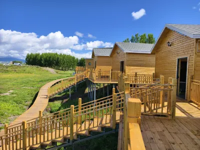 Zhaosu Hua Jian Pu Su Hotels near Grassland Stone Human Scenic Area