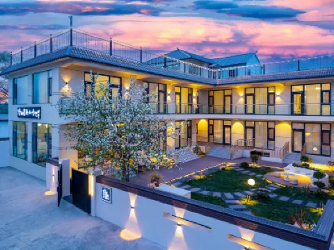 Xinyuan Shuaifu Farmhouse Restaurant Hotéis em 