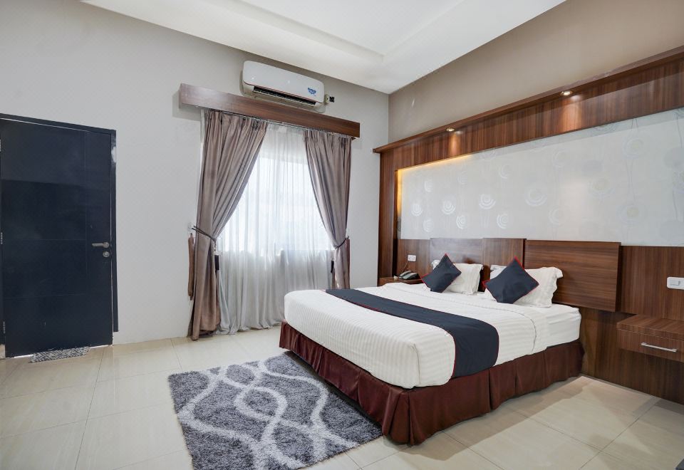 으까삭띠대학교 근처에 위치한 호텔 Townhouse Oak Padang의 전경