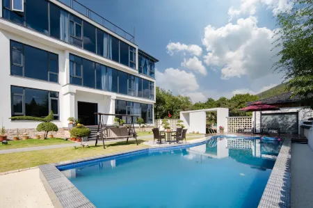 Shenju bieyuan Changxing Zhuhai Garden Holiday B & B Отели рядом с достопримечательностью «Xinsijunsuzhejunqu Memorial Hall»