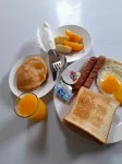 Aasna Inn - Desayuno