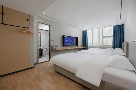 Shangyue Preferred Hotel (Zhengzhou Xinzheng Longhu Jinyicheng Shopping Center) Отели рядом с достопримечательностью «Henan Mechanical and Electrical Vocational College»