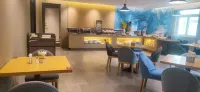 홈인 호텔(린이 창산 란링루 카이위안상청)