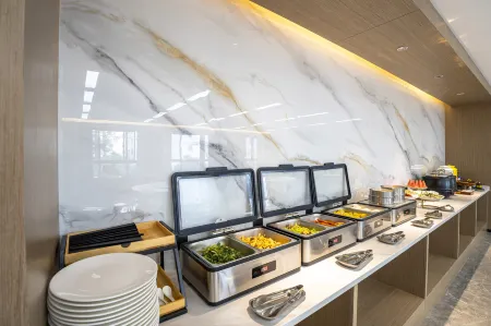 Mida Ruijing Hotel Отели рядом с достопримечательностью «Xi'an Aeronautical Polytechnic Institute»