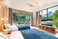 Qian Na Mei Su Hotel (Xinxiang Baligou) 곽량터널 주변 호텔