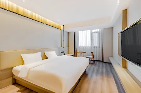 Baiya Yueting wisdom Hotel (Bozhou railway station store) Отели рядом с достопримечательностью «Baiyi Buddhist Convent»