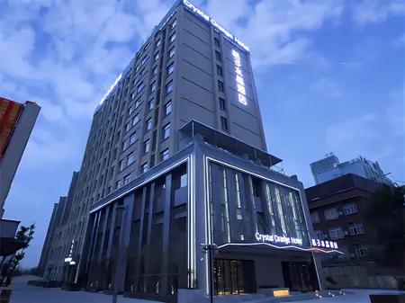 Orange Crystal Hotel Shanghai Zhoupu Wanda (Prosperity Road Metro Station) Отели рядом с достопримечательностью «Shanghai Graduate School of China University of Technology»