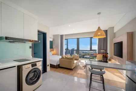 Changchun Manfori Hotel Apartment (Jingyue Mingyu Plaza) Отели рядом с достопримечательностью «Changchun University of Chinese Medicine»