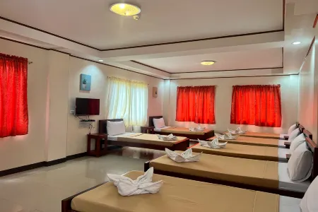 Dinah's Tourist Inn Отели в г. Пуэрто-Принсеса