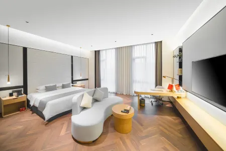 Yuexin Hotel Отели рядом с достопримечательностью «Quxian Confucian Temple»