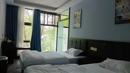 Jiulong Business Hotel Отели рядом с достопримечательностью «Zhangjiagang Campus， the City Vocational College of Jiangsu (Binjiang Avenue)»