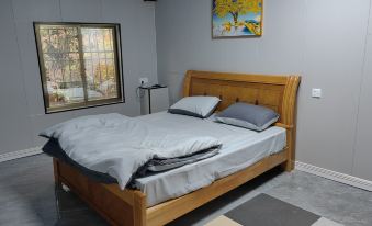 Xuwen Jiaoweixiang Nanyuan Homestay