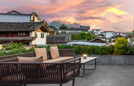 Lijiang Ma'an Linlu Boutique Homestay Отели рядом с достопримечательностью «Wenfeng Temple»