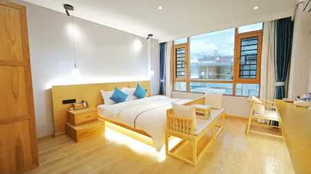 Midu Shanmushui B&B (Huadeng Square) Отели в г. Миду