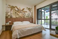 Xinrongju Homestay (Mangshi Daigu Town Branch)