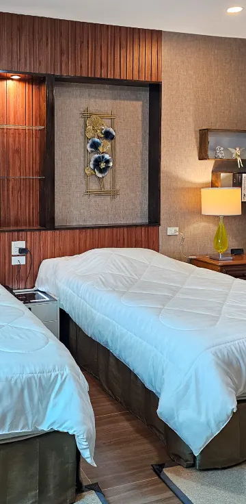 ห้องดีลักซ์เตียงแฝดพร้อมสระว่ายน้ำ