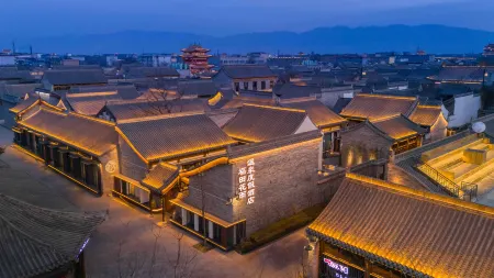 Futian Huayu Hot Spring Resort Hotel (Xinzhou Ancient City) Отели рядом с достопримечательностью «Xinzhou Ancient City - South Gate Tower»