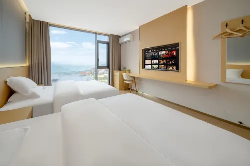 Xijiang Qianhu Miaozhai Longmen Theme Hotel