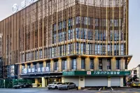 Huashuyi Hotel (Huzhou Zhili Wuyue Plaza China Children's Wear City) - فطور