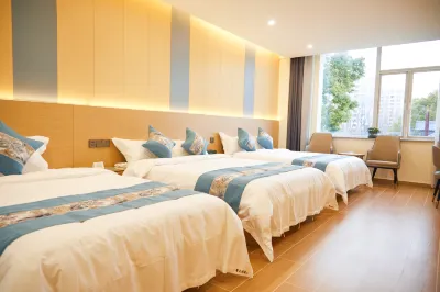 Xintun Holiday Hotel（Shanghai Jiuting Subay Station Branch） โรงแรมในซินซวง, ซิเปา