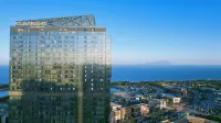 Four Points by Sheraton Qingdao, West Coast Отели рядом с достопримечательностью «Кунг Наньли Торговый Билдинг»