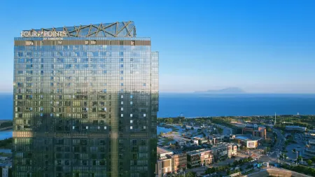 Four Points by Sheraton Qingdao, West Coast Отели рядом с достопримечательностью «Lingshanwan Seaside Park»