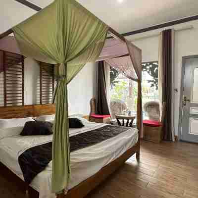 Jinghong Manzhelan Inn Rooms