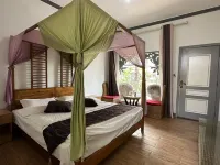 Jinghong Manzhelan Inn - Holiday Apartments