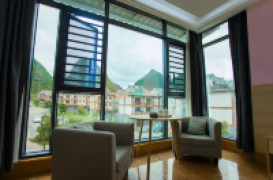 Libo Xiaoqikong Xinjiayuan Inn