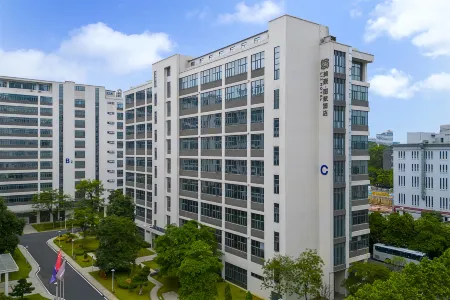 MEHOOD LESTIE Hotel (Guangzhou Huangpu Baoneng Performance Center) Отели рядом с достопримечательностью «Siwanggang Park»