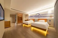 Baihe International Hotel (Weifang Fuhua Exhibition Center Good Plaza)