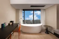 Niduo Puyue Liangshe (Leshan High Speed Railway Station Shihao Plaza Store)