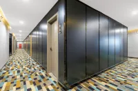 Unitour Hotel (Xingyi Jushan Square Wanfenglin Airport) - مطابخ