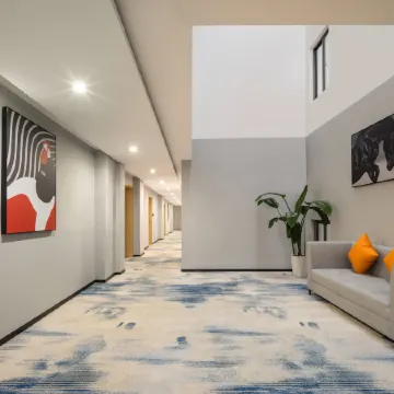 Junyi Chain Hotel Du'an High speed Railway Station Branch