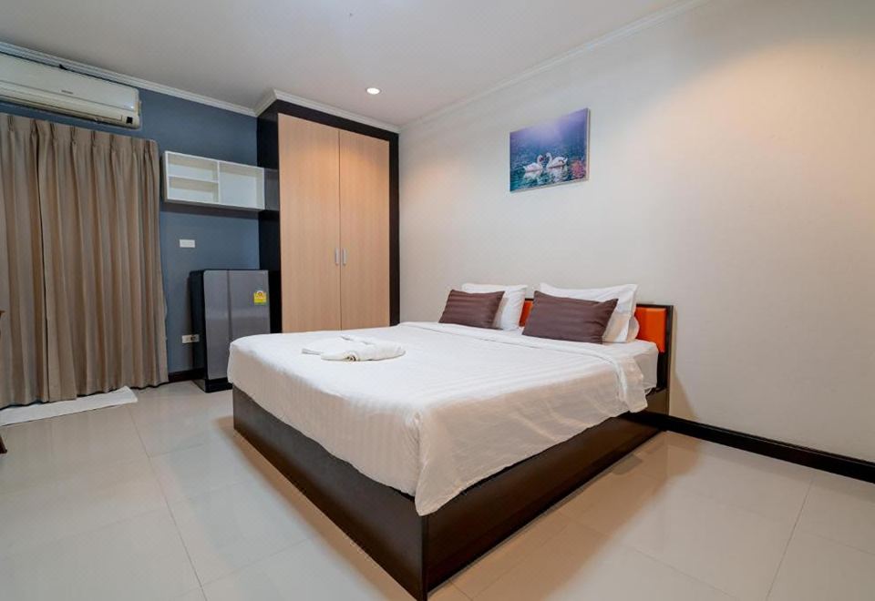 JT 플레이스 부리람 객실