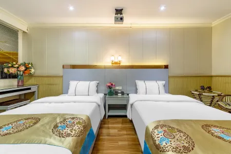 Home Inn Huaxuan Collection Hotel (Suixi Quanfeng Plaza) Отели в г. Суйси