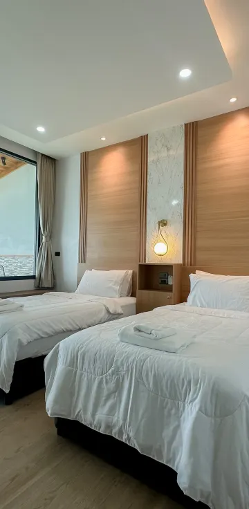 ห้องเตียงแฝดพร้อมวิวสระว่ายน้ำ