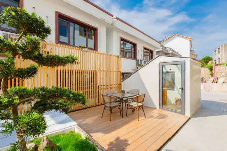 Banyue Yuge Guesthouse Отели рядом с достопримечательностью «Wanghai Tower»