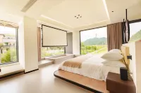 Yaoshan Xu · Natural Qixin | Minimalist Modern Qingning Boutique Stay - Beach