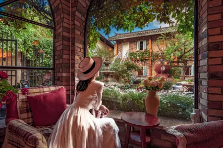 GUANXIN · Half a Mile | Monet Garden Inn Monet Garden