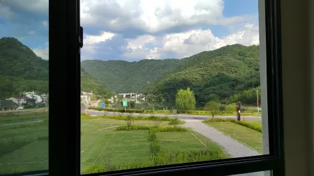 Huoshan Xinglin Shanju Отели рядом с достопримечательностью «Dabie Mountain Main Peak (Baima Main Peak)»