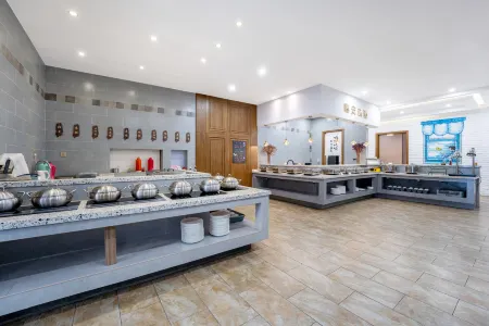 Qixin Hotel Отели рядом с достопримечательностью «Zhejiang A & F University Yijin Campus»